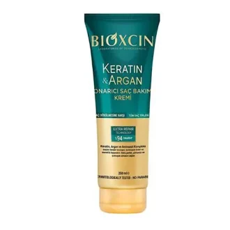 ماسک مو ترمیم‌کننده و مرطوب‌کننده حاوی کراتین و روغن آرگان بیوکسین | Bioxcin